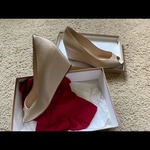 Sable christian louboutin wedges.